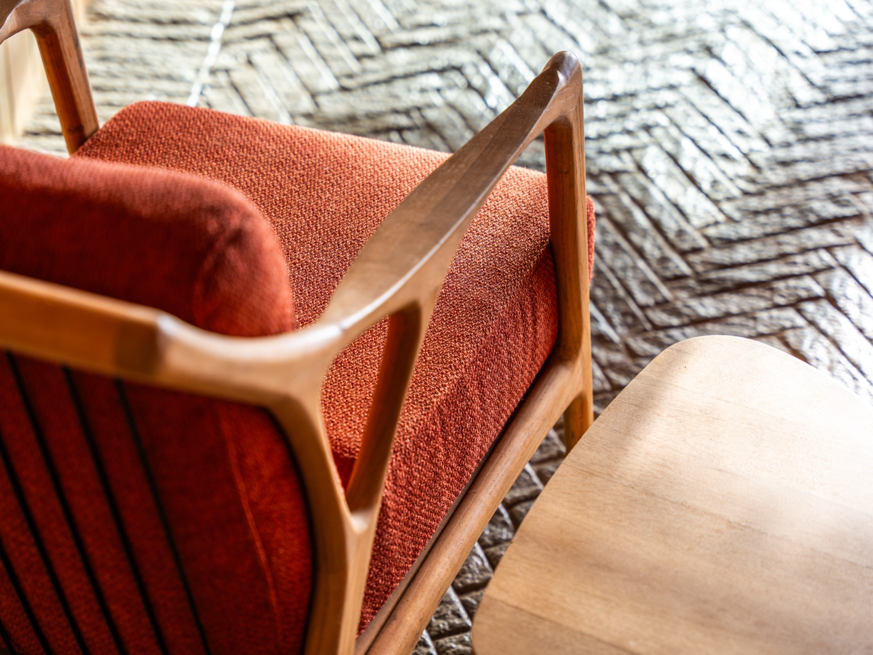 Styled armchair interior detail — guest stay photography